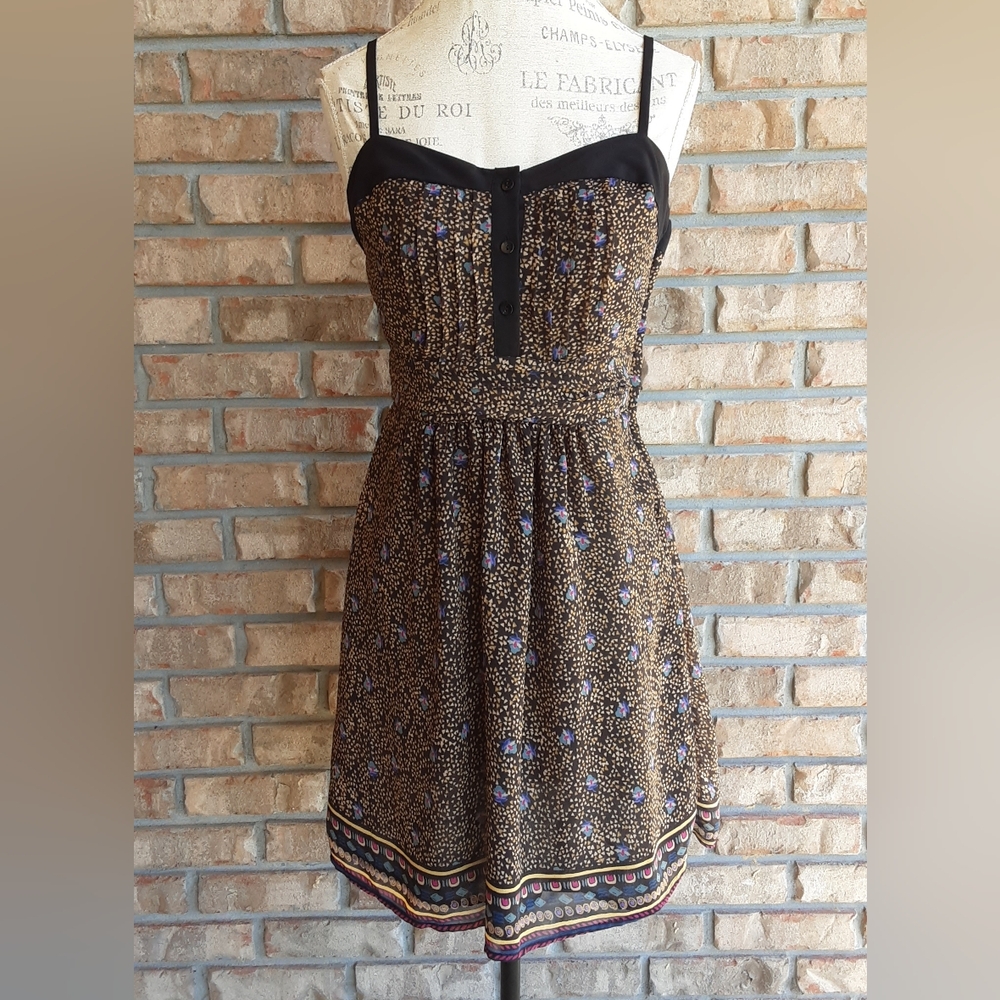 Staring at Stars Black and Brown Mini Dress With Adjustable Shoulder Straps.